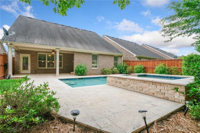 123 Meridian Dr, Woodstock, GA 30188 - view of swimming pool with an in-ground hot tub, a ceiling fan, a patio area, and a fenced backyard