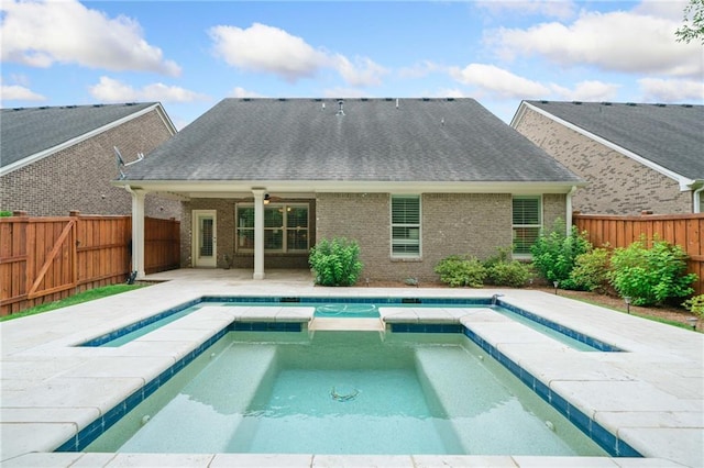 123 Meridian Dr, Woodstock, GA 30188 - view of swimming pool with an in-ground hot tub, ceiling fan, a patio area, and a fenced backyard
