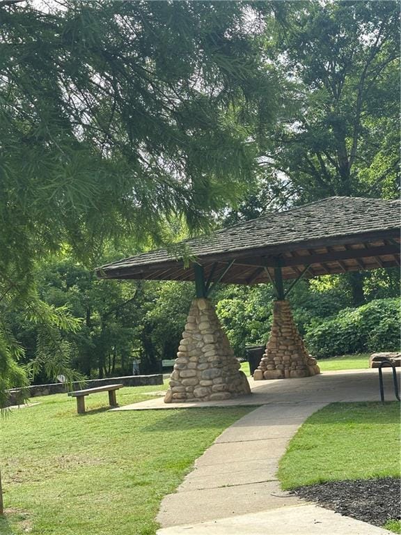 123 Meridian Dr, Woodstock, GA 30188 - surrounding community with a yard, a gazebo, and view of wooded area
