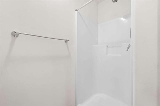 bathroom with a shower