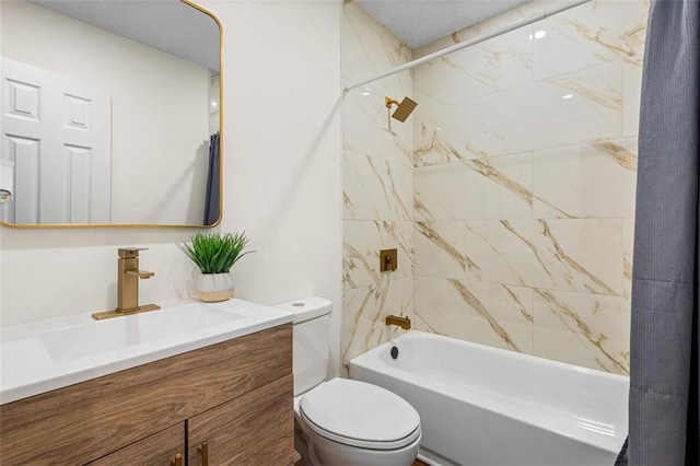 bathroom featuring toilet, bathtub / shower combination, and vanity