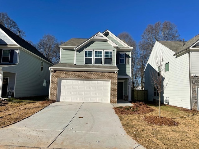 view of front of property featuring a garage