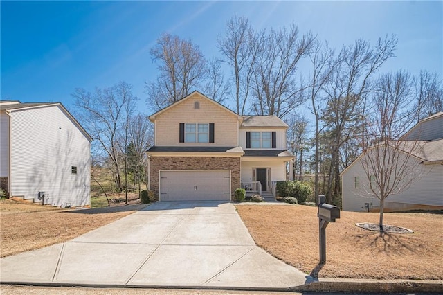 view of front facade with a garage and driveway