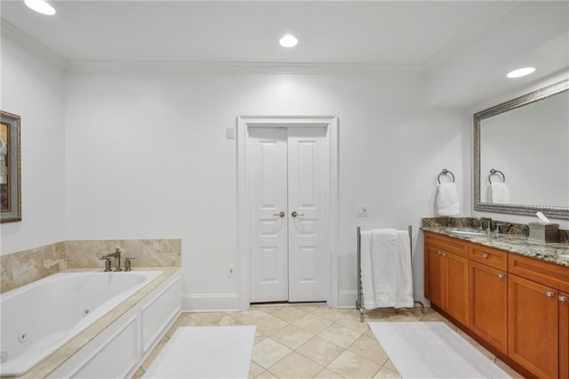 full bathroom with tile patterned flooring, a sink, ornamental molding, a whirlpool tub, and double vanity