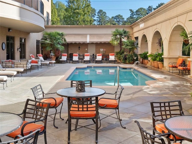 pool with a patio