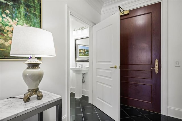 bathroom with crown molding and tile patterned floors