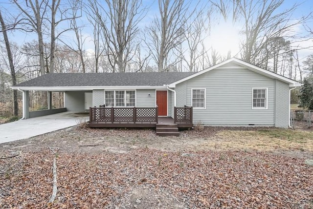 3406 Blackberry Ln, Villa Rica, GA 30180 - view of front of house featuring a carport, driveway, a wooden deck, and crawl space