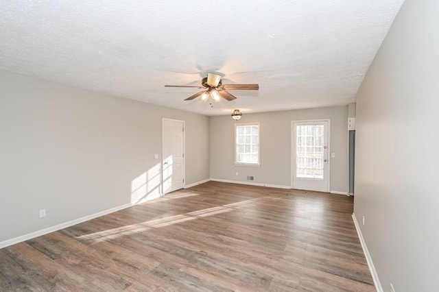 3406 Blackberry Ln, Villa Rica, GA 30180 - spare room featuring a ceiling fan and wood finished floors