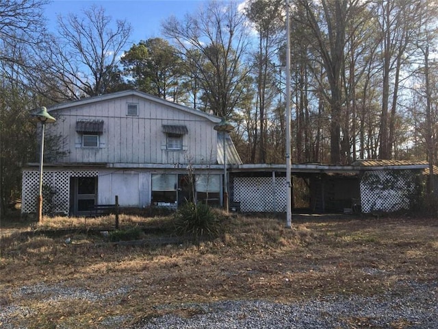 exterior space featuring a carport