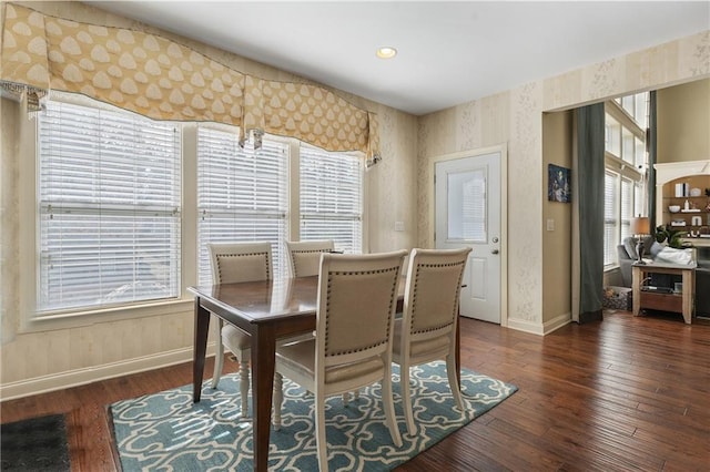 dining space with dark wood-type flooring