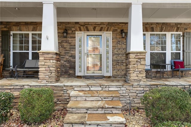 property entrance with a porch