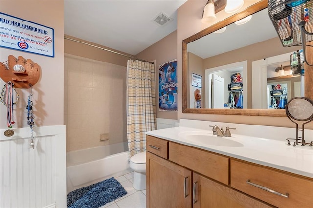 full bathroom with toilet, vanity, shower / tub combo with curtain, and tile patterned floors