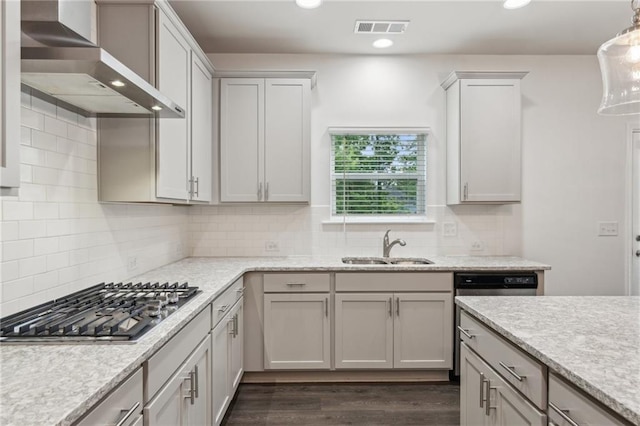 6360 Boulder Rdg, Cumming, GA 30028 - kitchen featuring wall chimney range hood, appliances with stainless steel finishes, a sink, dark wood finished floors, and recessed lighting