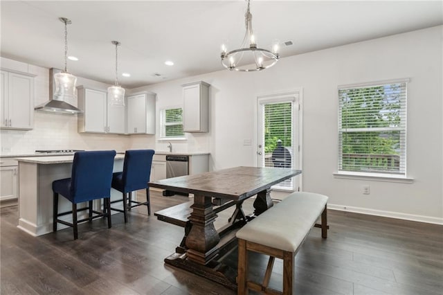6360 Boulder Rdg, Cumming, GA 30028 - dining area featuring dark wood finished floors, a chandelier, recessed lighting, and baseboards