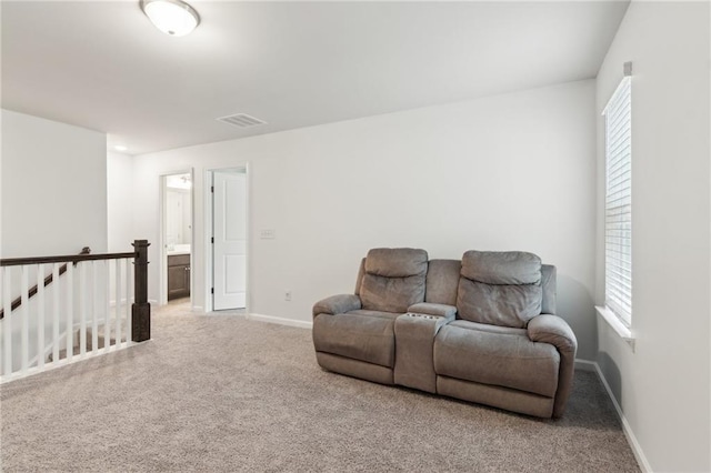 6360 Boulder Rdg, Cumming, GA 30028 - sitting room featuring an upstairs landing, carpet flooring, and baseboards