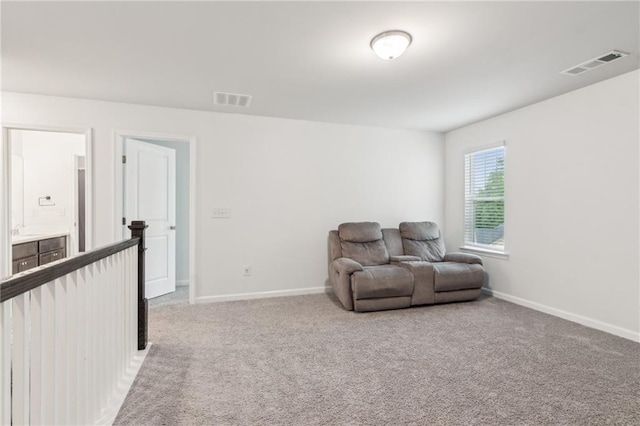 6360 Boulder Rdg, Cumming, GA 30028 - sitting room featuring baseboards and light carpet