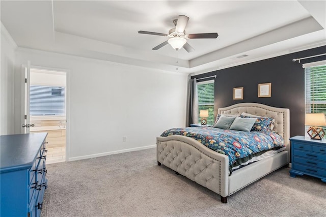 6360 Boulder Rdg, Cumming, GA 30028 - carpeted bedroom featuring a raised ceiling, multiple windows, baseboards, and ceiling fan
