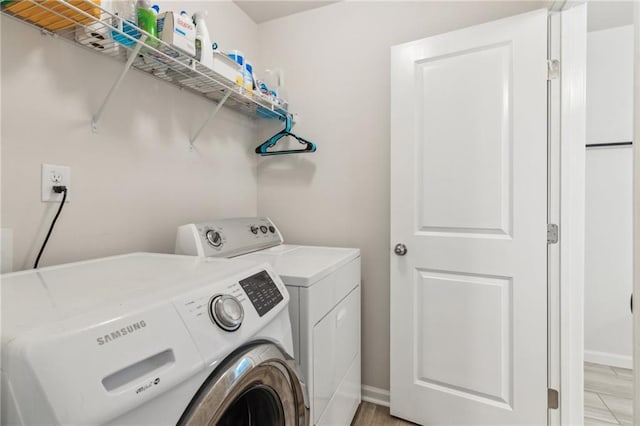 6360 Boulder Rdg, Cumming, GA 30028 - laundry area with separate washer and dryer and baseboards