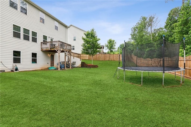 6360 Boulder Rdg, Cumming, GA 30028 - view of yard with a trampoline and a deck