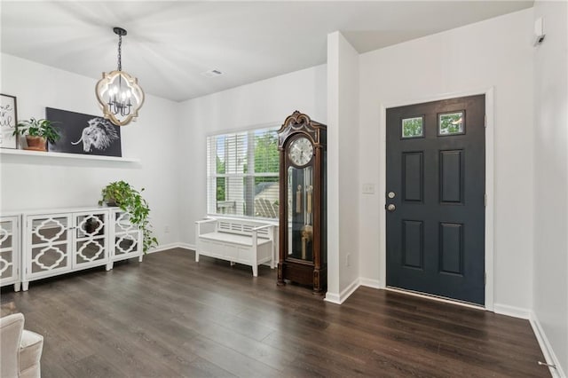 6360 Boulder Rdg, Cumming, GA 30028 - foyer entrance with a chandelier, wood finished floors, and baseboards