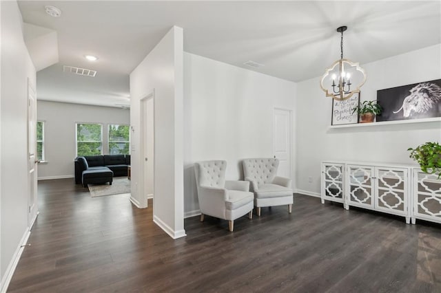 6360 Boulder Rdg, Cumming, GA 30028 - sitting room with dark wood finished floors, a chandelier, baseboards, and recessed lighting