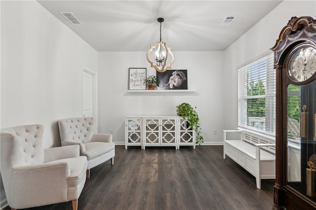 6360 Boulder Rdg, Cumming, GA 30028 - living area featuring a chandelier, dark wood-type flooring, and baseboards