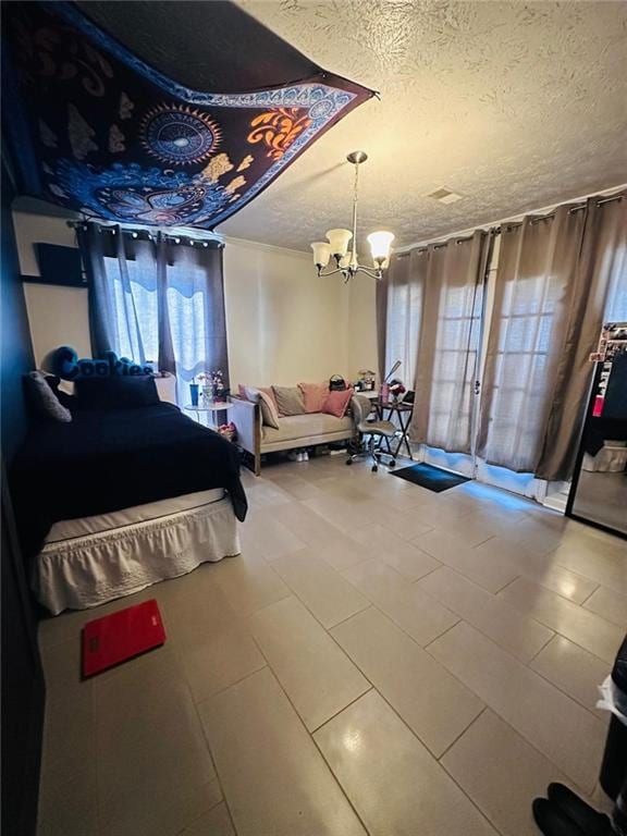 4312 Idlewood Ln, Tucker, GA 30084 - bedroom featuring a textured ceiling and a chandelier