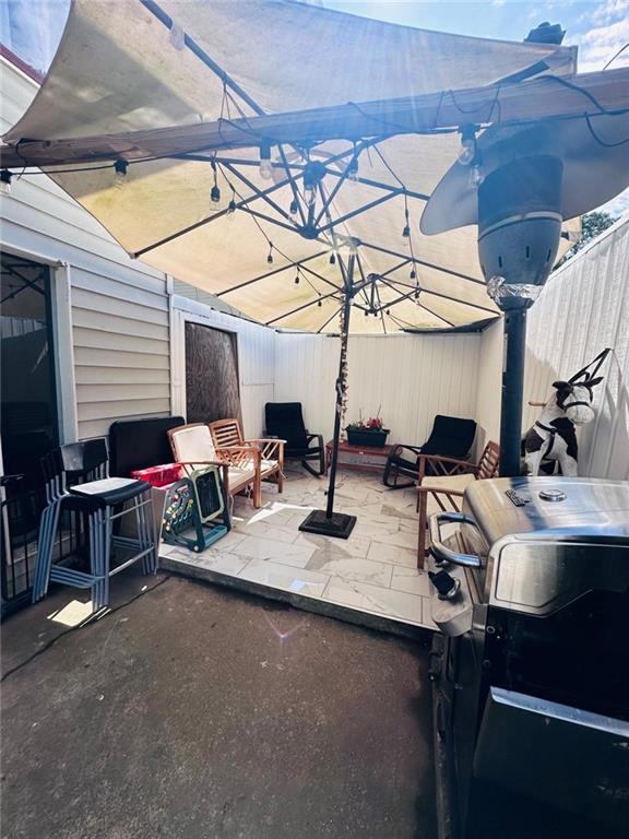 4312 Idlewood Ln, Tucker, GA 30084 - view of patio / terrace featuring a grill
