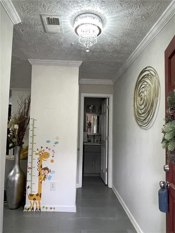 4312 Idlewood Ln, Tucker, GA 30084 - hall with baseboards, a chandelier, and dark tile patterned floors
