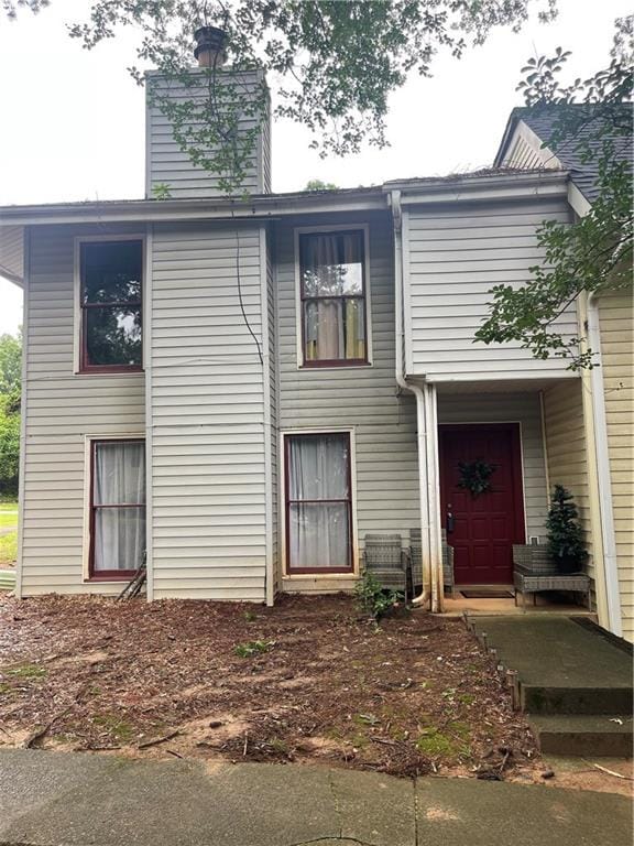 4312 Idlewood Ln, Tucker, GA 30084 - view of front facade featuring a chimney