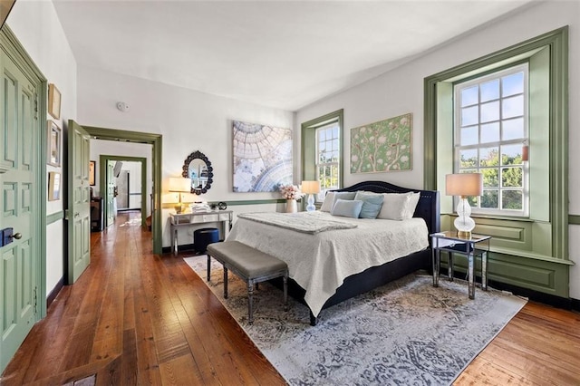 bedroom with hardwood / wood-style flooring