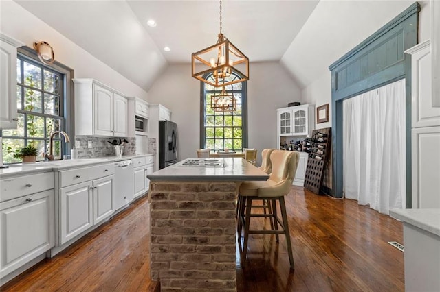 bedroom featuring access to exterior, wood-type flooring, french doors, and ornamental molding