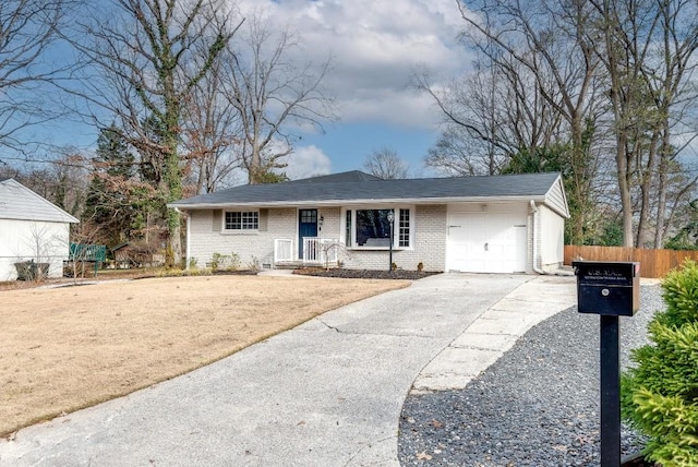 single story home featuring a garage