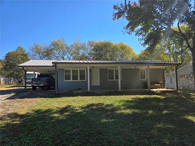 view of front of property with a porch, a carport, and a front lawn