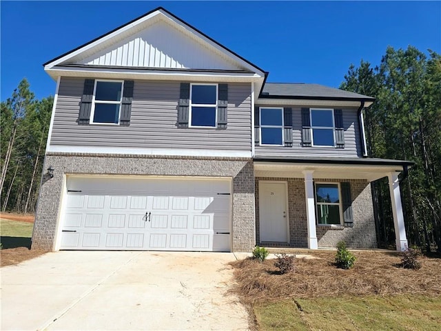 15 Fontana Ct, Covington, GA 30016 - view of front of property with brick siding, covered porch, a garage, and driveway