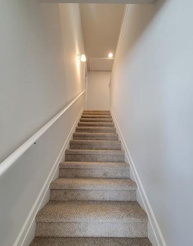 15 Fontana Ct, Covington, GA 30016 - stairway with carpet floors