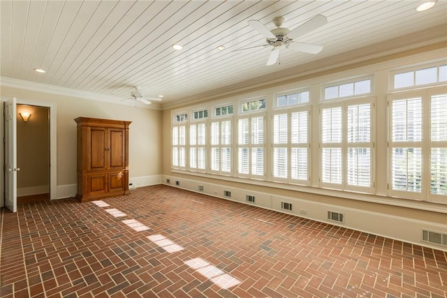 spare room featuring ornamental molding, ceiling fan, and wood ceiling