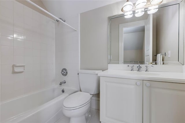 full bathroom featuring vanity, tile patterned flooring, toilet, and tiled shower / bath combo