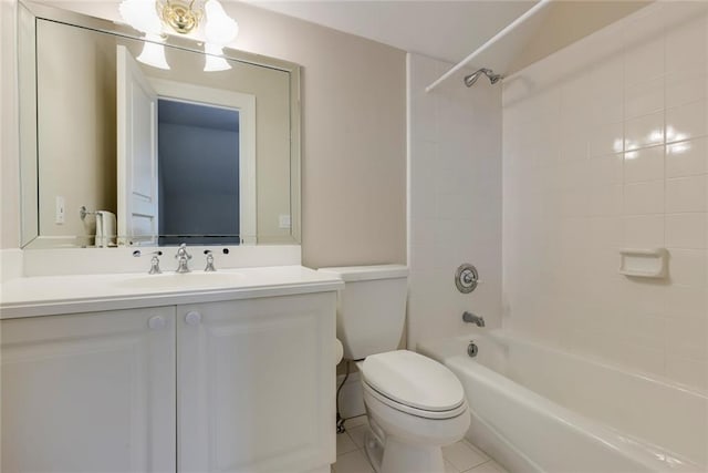 full bathroom featuring tile patterned floors, vanity, toilet, and tiled shower / bath