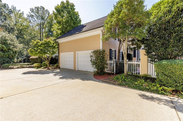 view of home's exterior with a garage