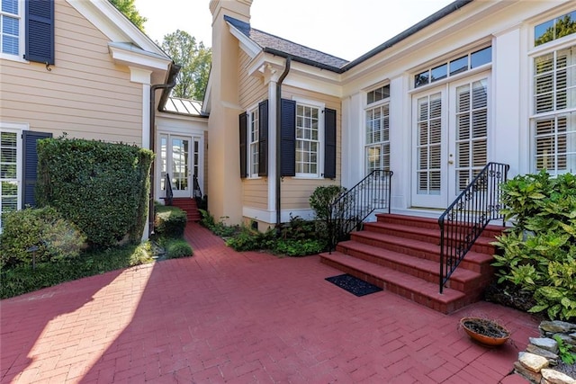 entrance to property with a patio area