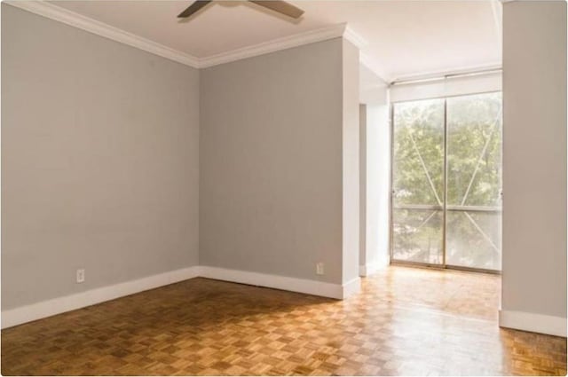 spare room featuring ornamental molding, parquet floors, and ceiling fan