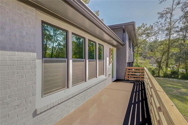 view of property exterior featuring a balcony