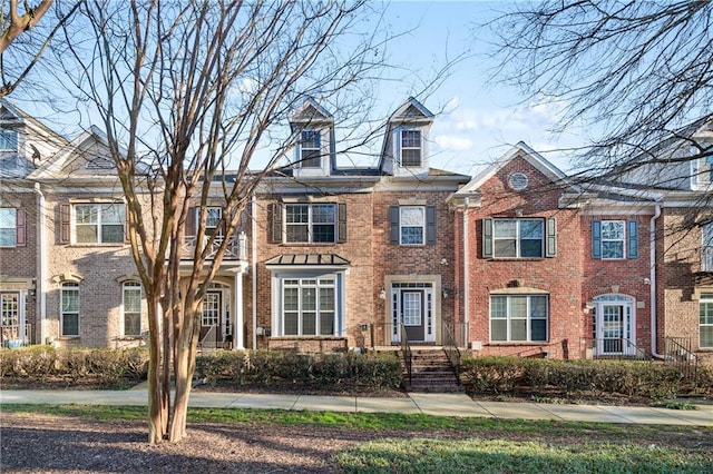 view of front of property with brick siding