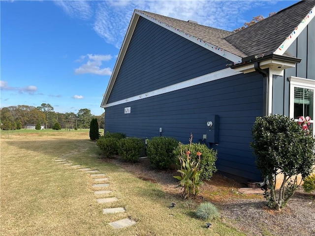 view of home's exterior featuring a yard