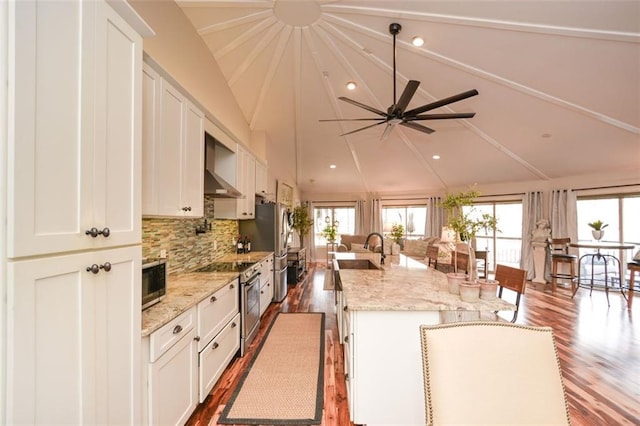 kitchen featuring a sink and white cabinets