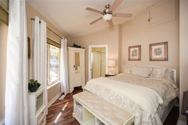 bedroom with dark wood-style floors, vaulted ceiling, and a ceiling fan