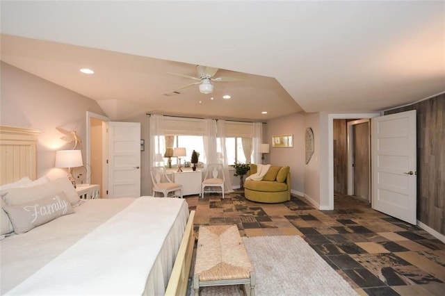 bedroom with dark floors, baseboards, and recessed lighting