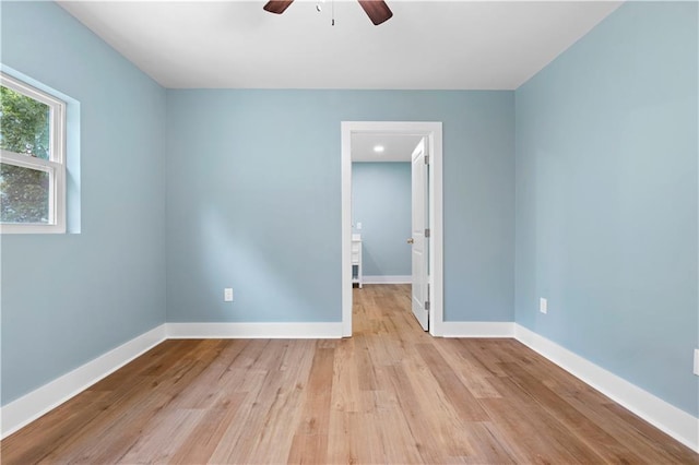 5233 Groovers Landing Rd SE, Acworth, GA 30101 - spare room with a ceiling fan and light wood-type flooring
