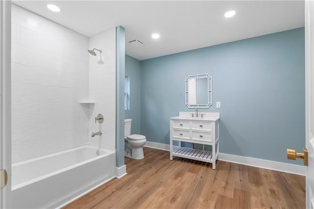 5233 Groovers Landing Rd SE, Acworth, GA 30101 - bathroom featuring vanity, tub / shower combination, wood finished floors, and recessed lighting